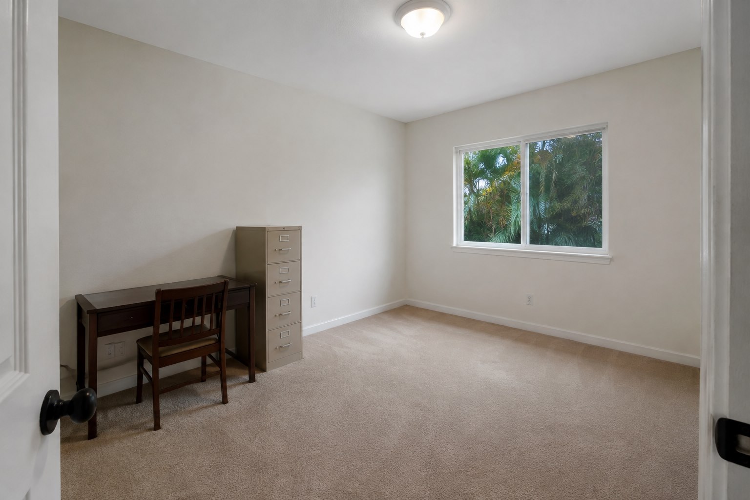 AI-generated spare room before home office conversion concept